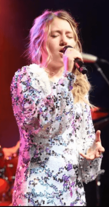Singer/Songwriter Impresses At Conference With Original Utah Themed Song