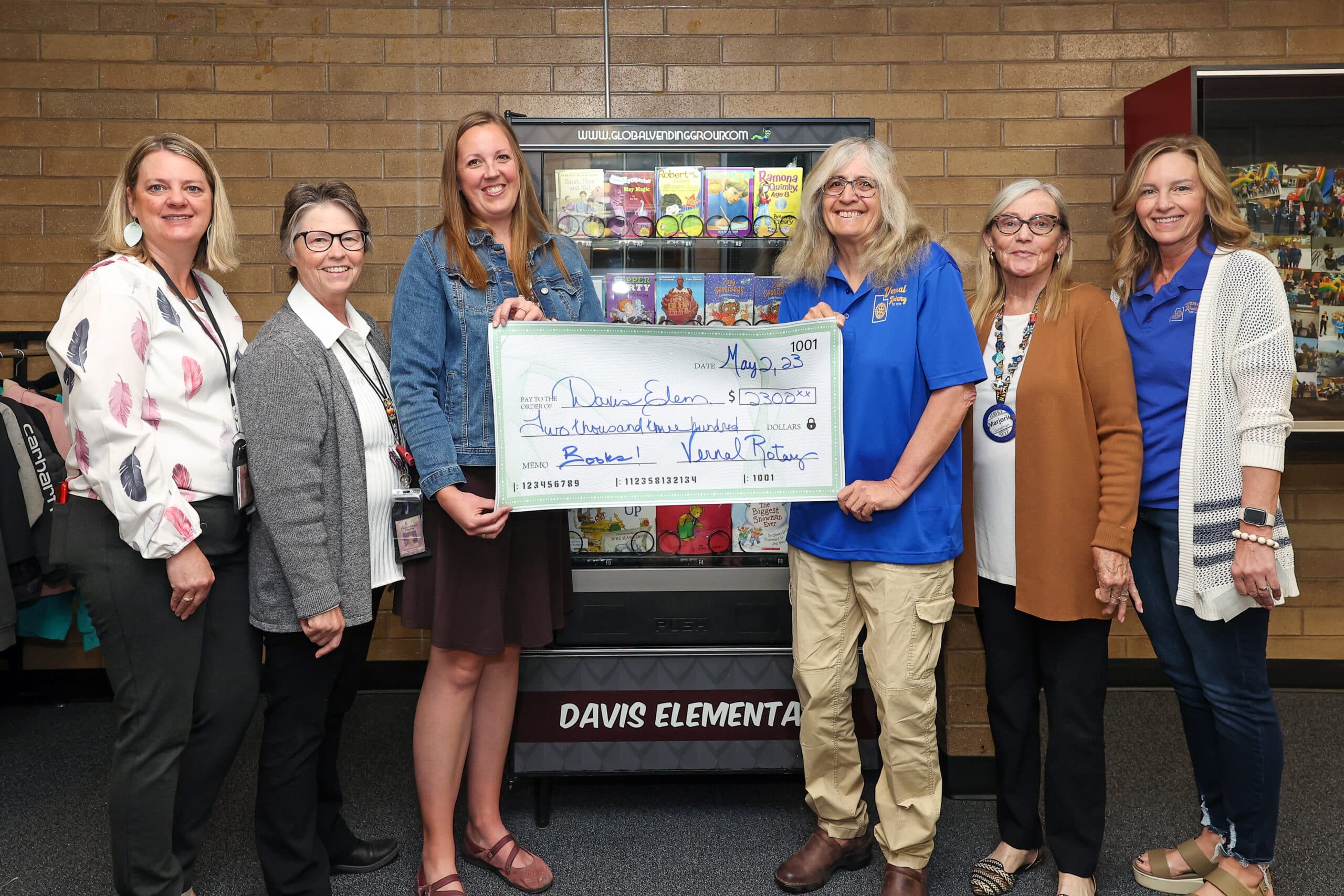 Vernal Rotary Club Donation To Stock Book Vending Machine