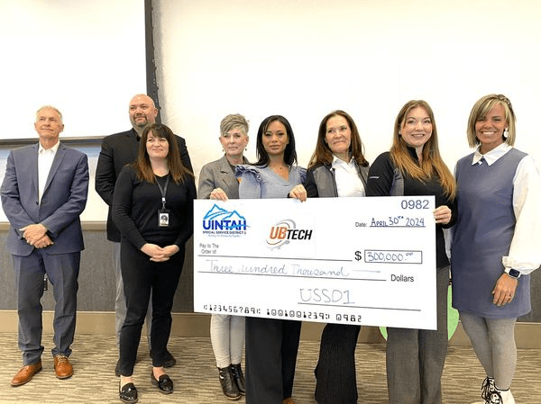 USSD1 Presents Checks For Higher Education