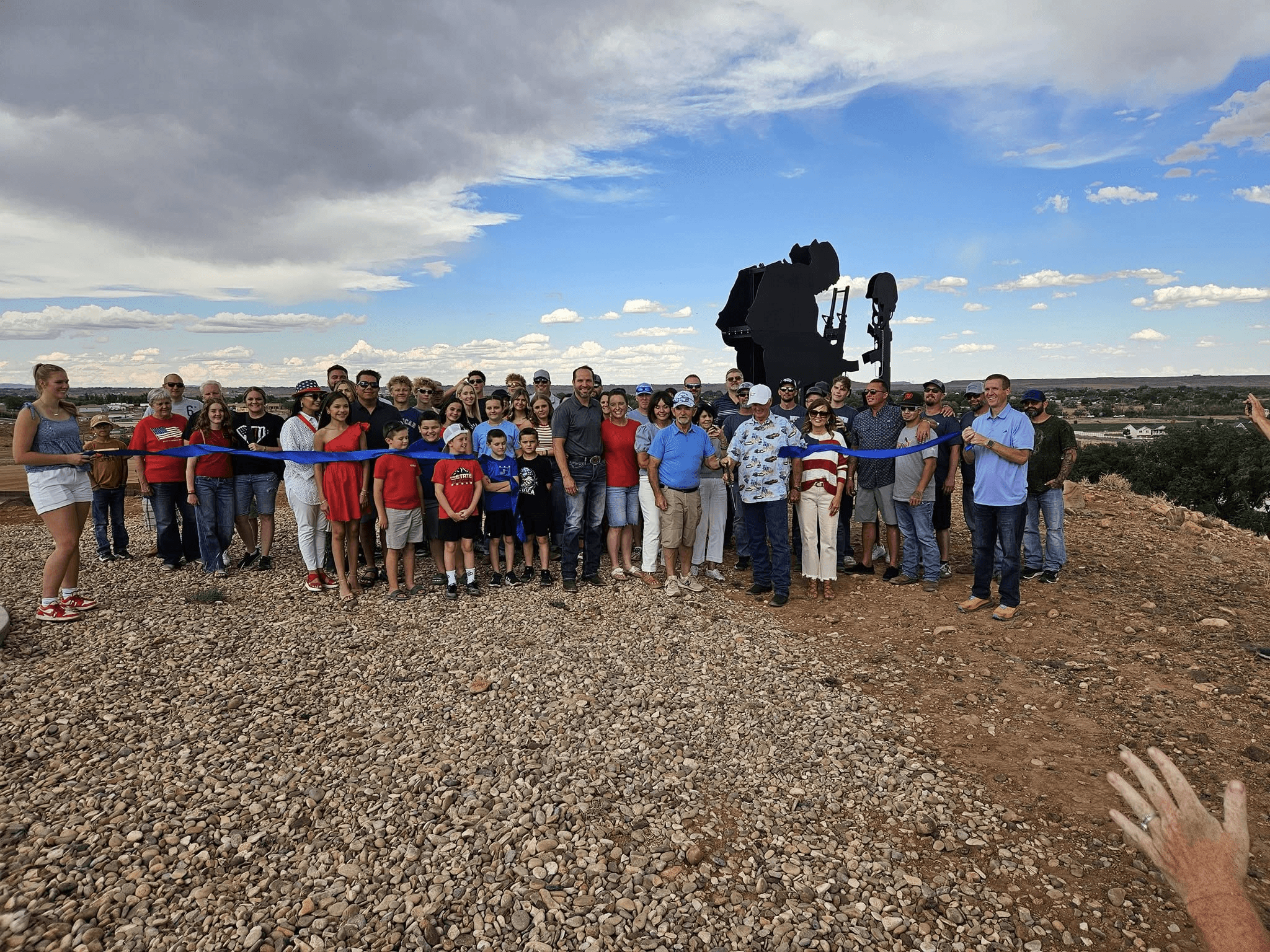 Ribbon Cutting For Soldier Silhouette Above Cemetery In Roosevelt City