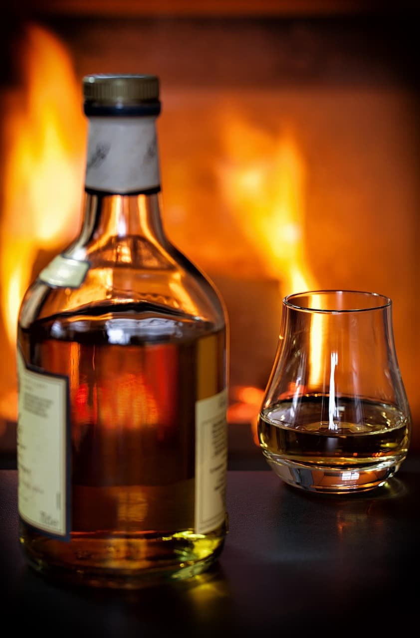 Woman Enters Fruitland Cabin, Assaults Husband With Whiskey Bottle