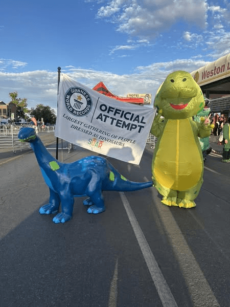 Dinosaurs Pack Main Street At Dinah SOAR Days For World Record Attempt