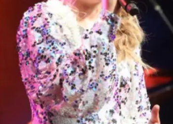 Singer/Songwriter Impresses At Conference With Original Utah Themed Song