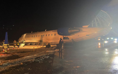 Commercial Flight Slides Off Runway At Airport In Rock Springs