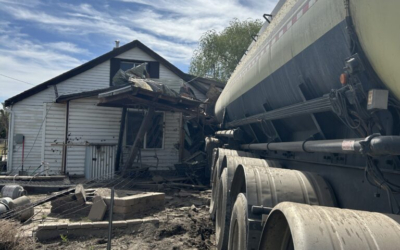 Loaded Tanker Truck Travels Off Highway 6, Runs Into Home, Injuring Occupants